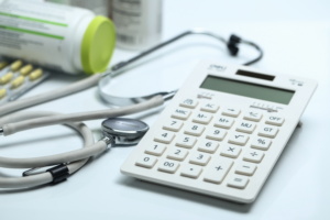 calculadora com estetoscópio