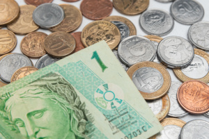 dinheiro financeiro moeda real indenização aposentadoria bonificação previdência benefício fiscal